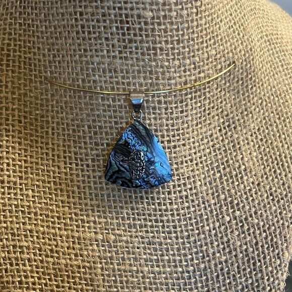 Triangle abalone shell pendant with sterling silver accents. - Picture 2 of 7